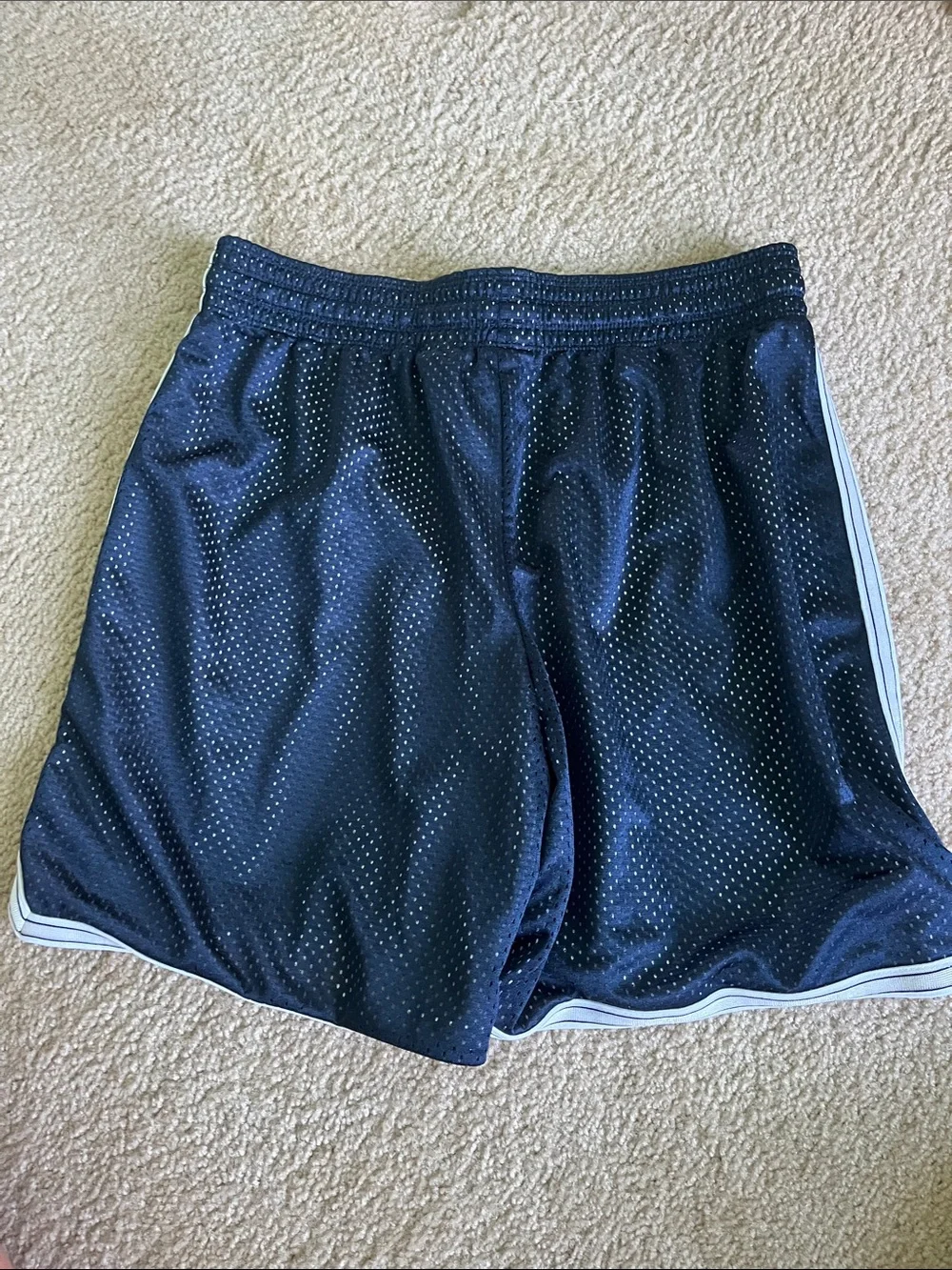 Nike Women's Black Athletic Mesh Shorts with White Trim and Drawstring